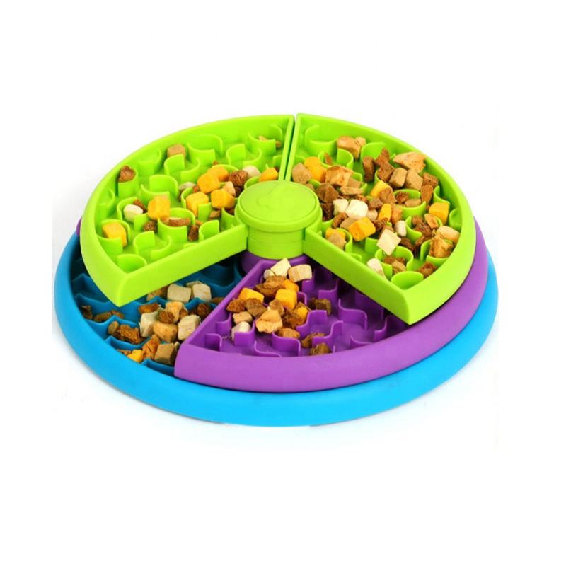 Rotating dog puzzle feeder filled with kibble and treats