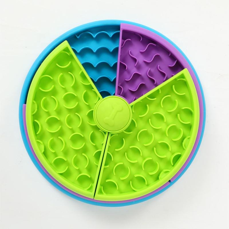 Top view of the green, purple and blue rotating puzzle feeder