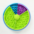 Top view of the green, purple and blue rotating puzzle feeder